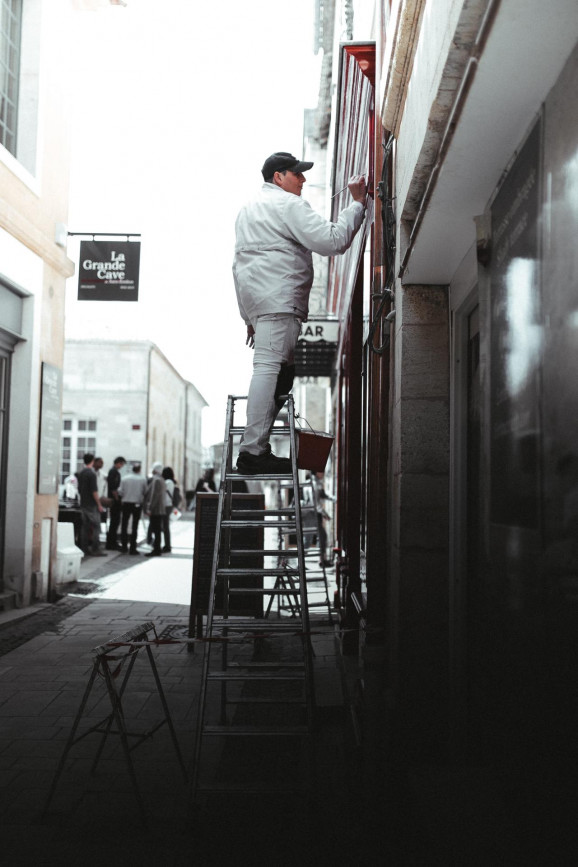 He has to work and I have to photograph it.